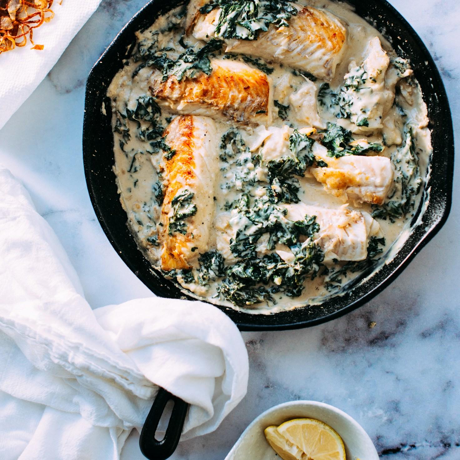 Diverse group of community members sharing a meal together, showcasing the social bonds formed through collaborative cooking
